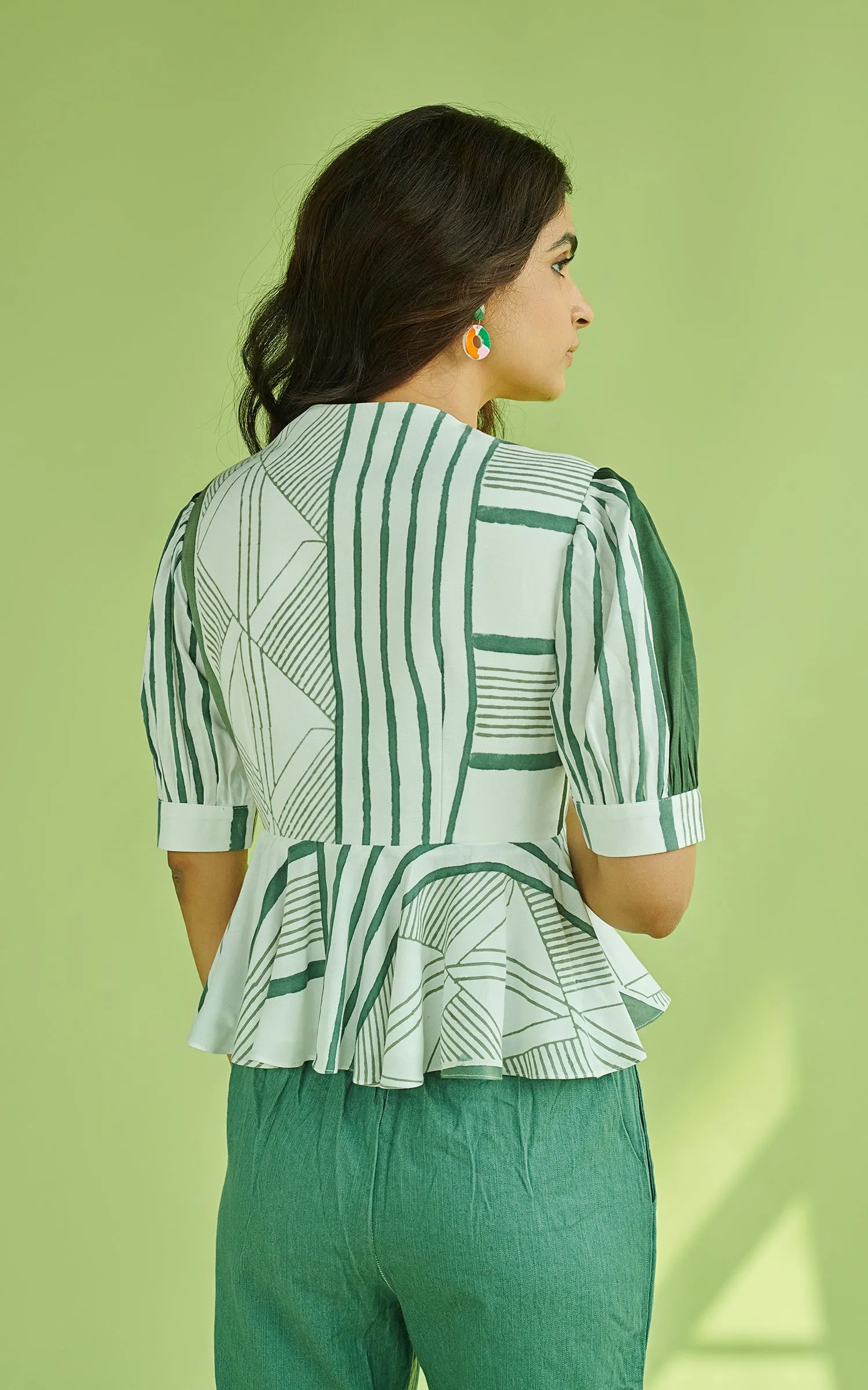 Geometric Printed Peplum Top